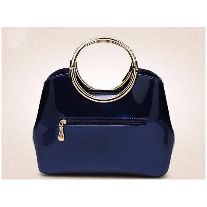 Women Shiny Glossy Faux-Leather Handbag with a Decorative Brass Buckle