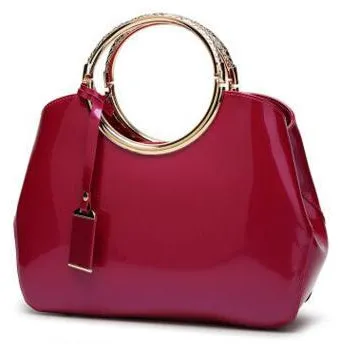 Women Shiny Glossy Faux-Leather Handbag with a Decorative Brass Buckle