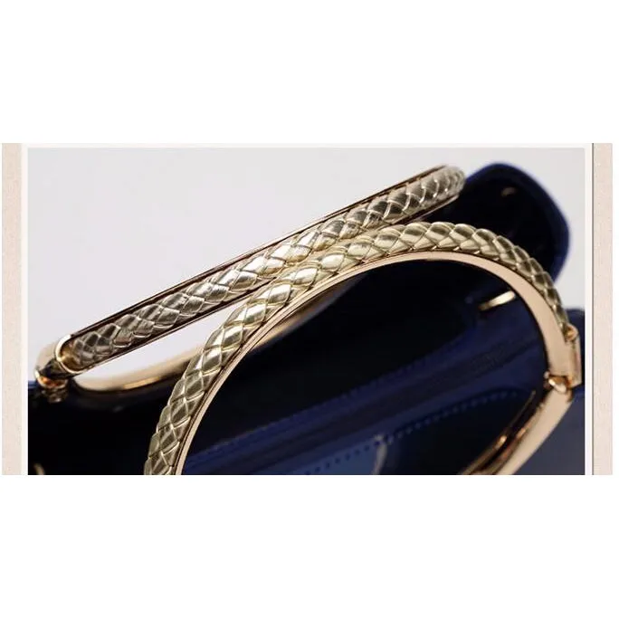 Women Shiny Glossy Faux-Leather Handbag with a Decorative Brass Buckle